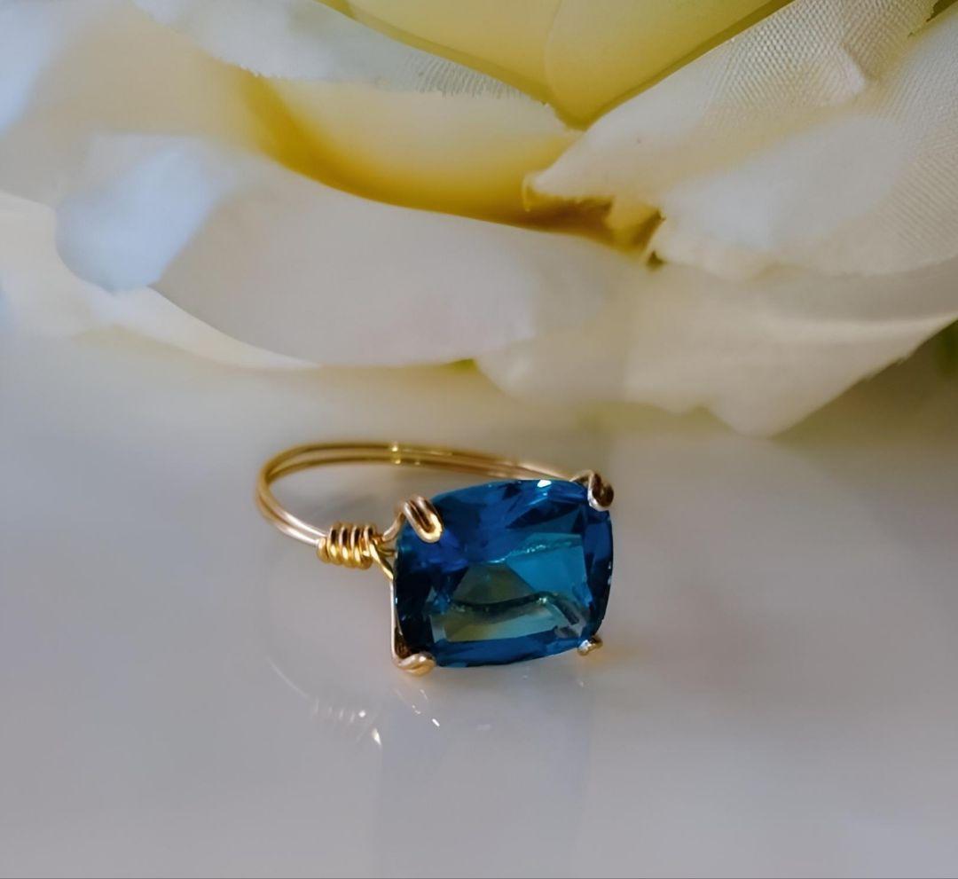 巨大 Kgf14 宝石ルース スイスブルートパーズ エメラルドカット 爪留め