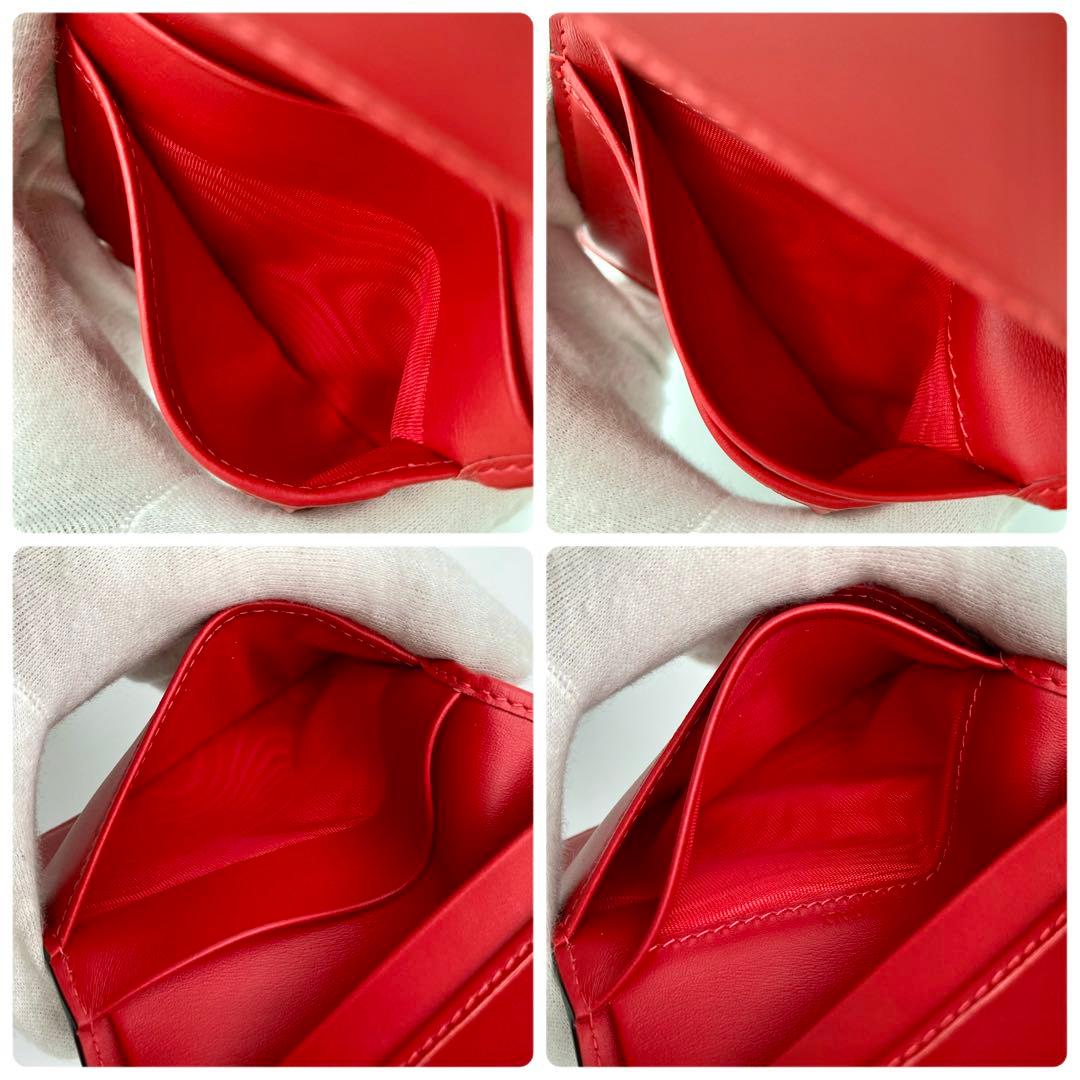 すぱいだーまん✨クリスチャンルブタン パロマ 二つ折り財布 黒×赤 ラバー