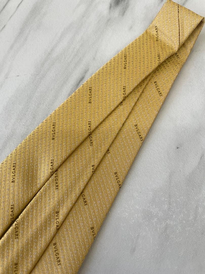 【新品箱タグ付】ブルガリ BVLGARI ロゴ総柄 ゴールド系 ネクタイ 黄色系
