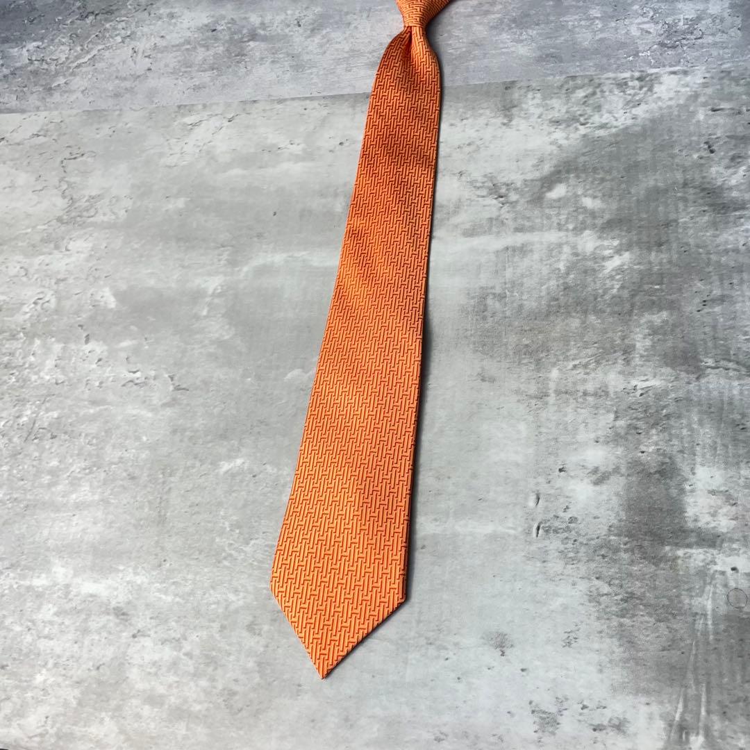 美品 HERMES エルメス H柄 総ロゴ ネクタイ オレンジ