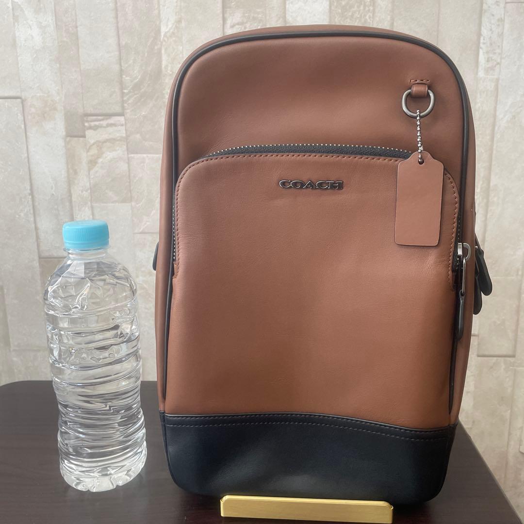 早い者勝ち！訳あり新品 COACH ボディバッグ サドル ブラウン×ブラック