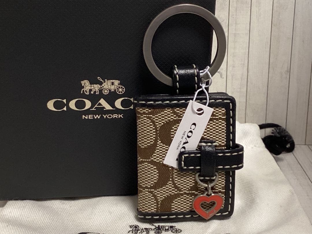 未使用タグ付きコーチCOACH ロゴ入りレザーキーホルダー写真入れ手帳本物