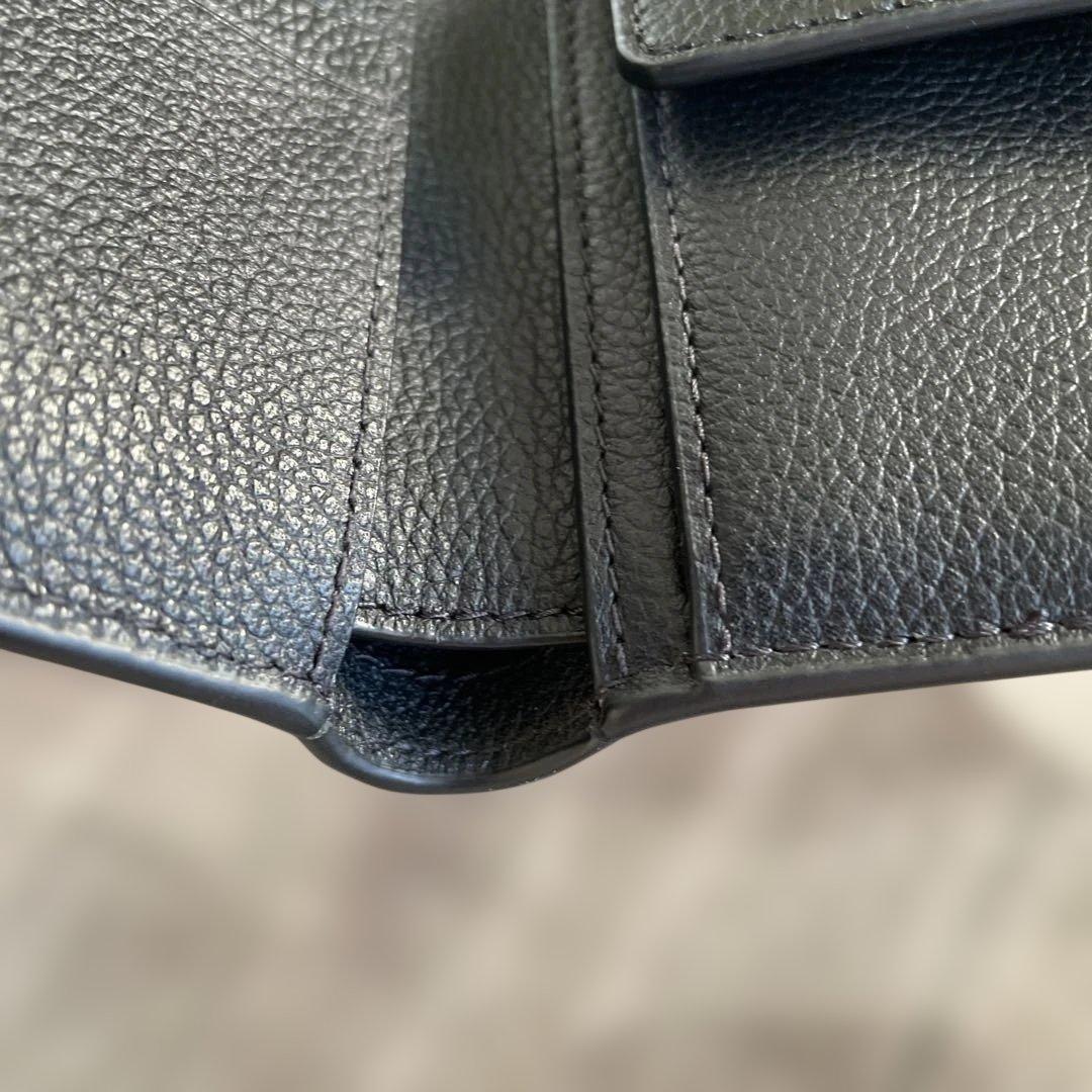 未使用　定価49,500円　COACH ブラック 二つ折り財布 ポケット付