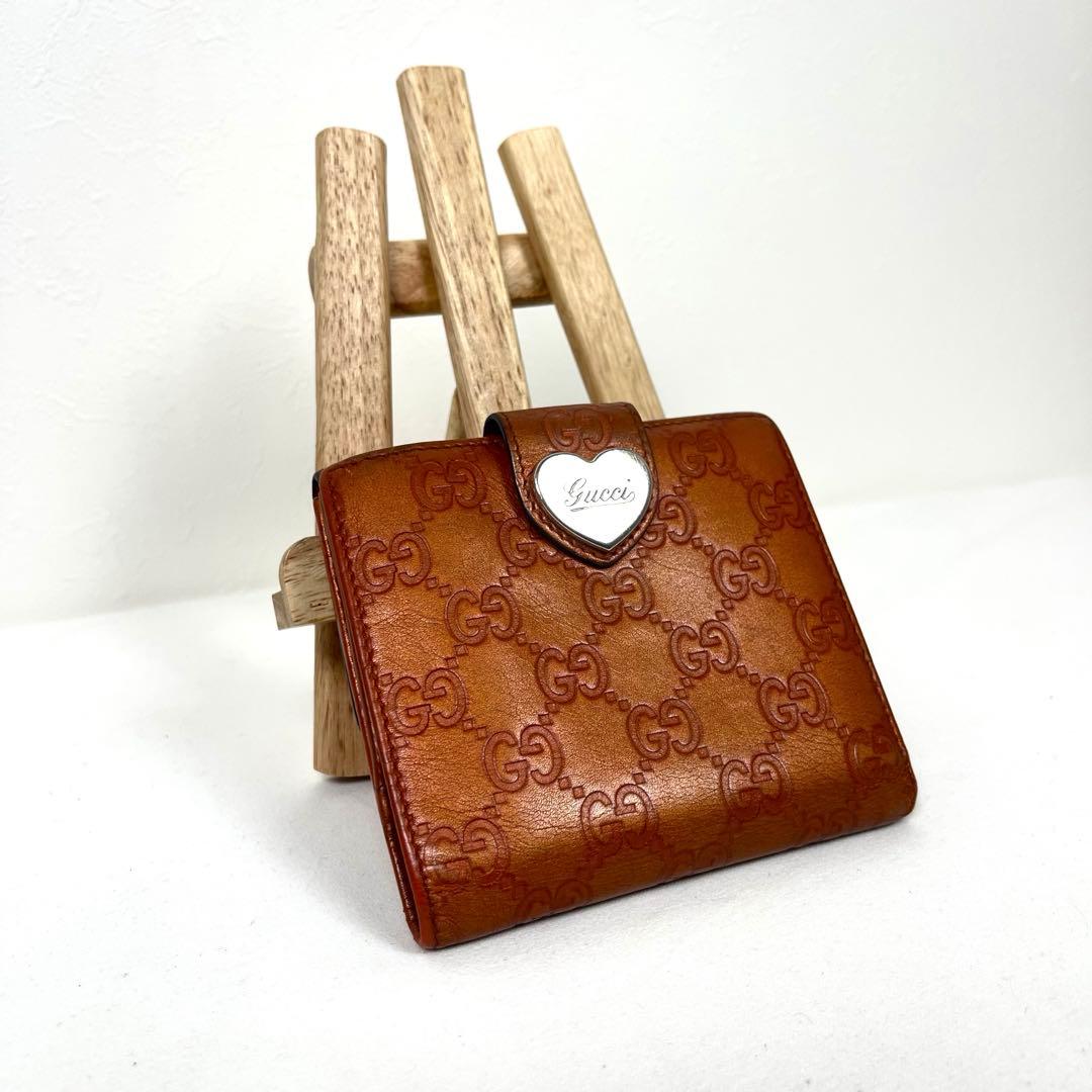 グッチ　二つ折り財布　ハートロゴプレート　GGシマレザー　型押しエンボス　美品