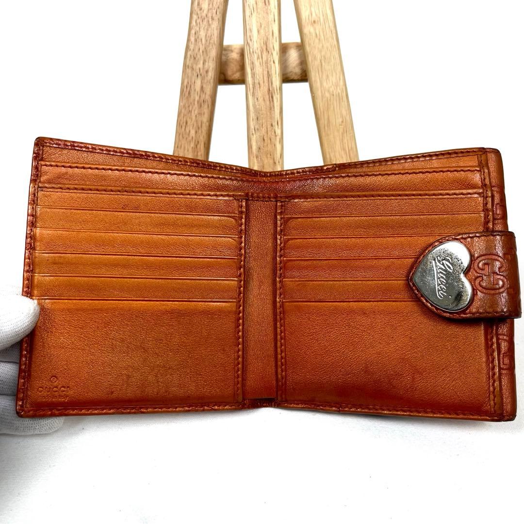 グッチ　二つ折り財布　ハートロゴプレート　GGシマレザー　型押しエンボス　美品