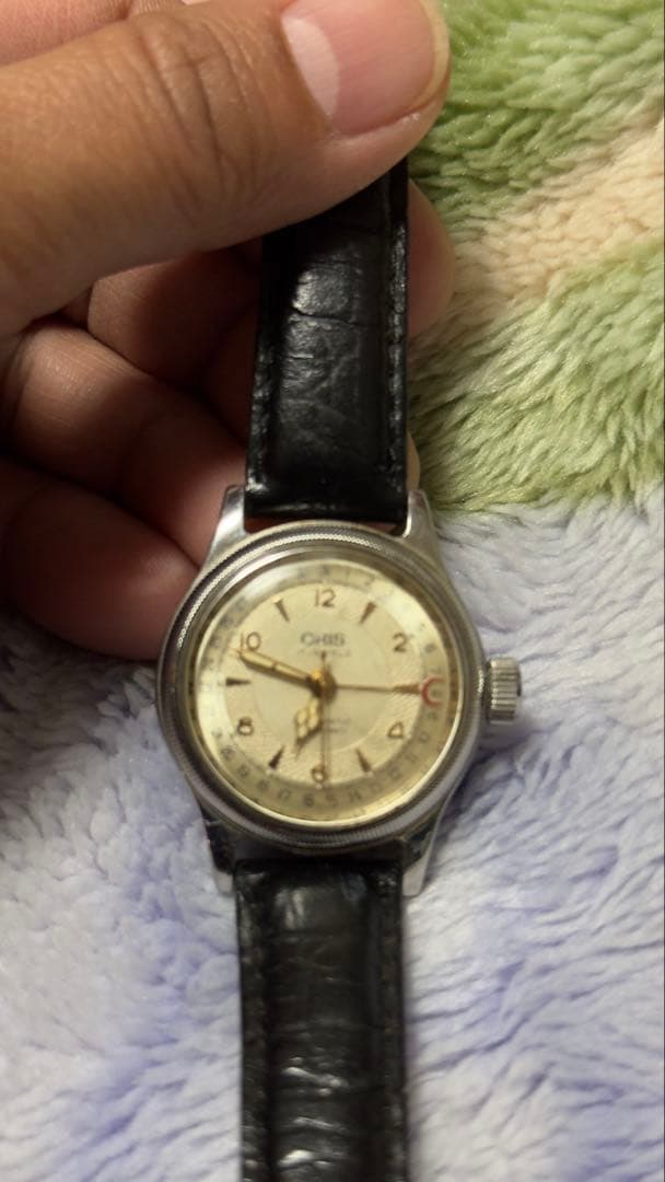 ビンテージのオリス ビッグクラウン ポインターデイト ウォッチです。