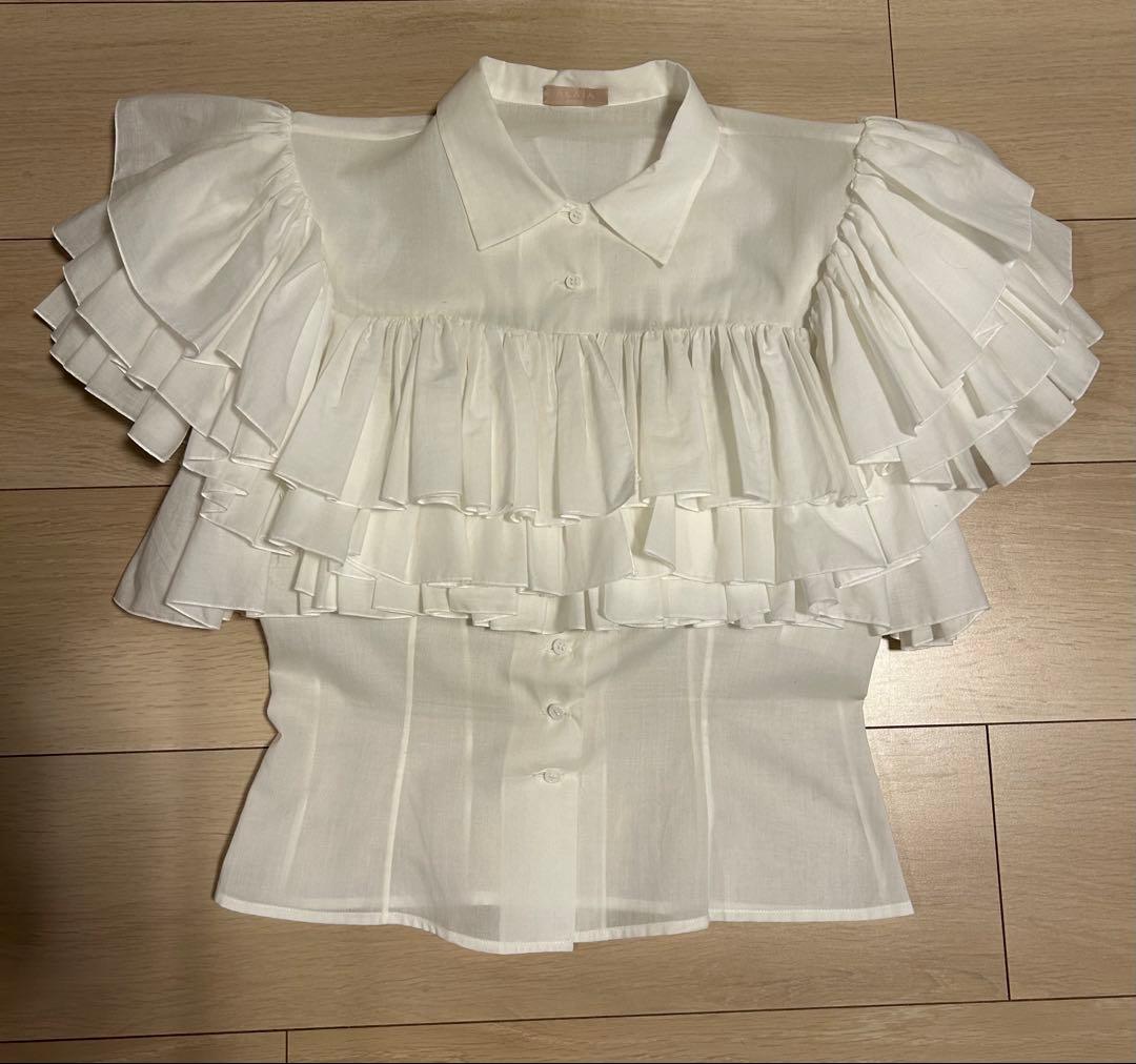 最終お値下げです。 Alaïa フリル付きホワイトブラウス　36サイズ