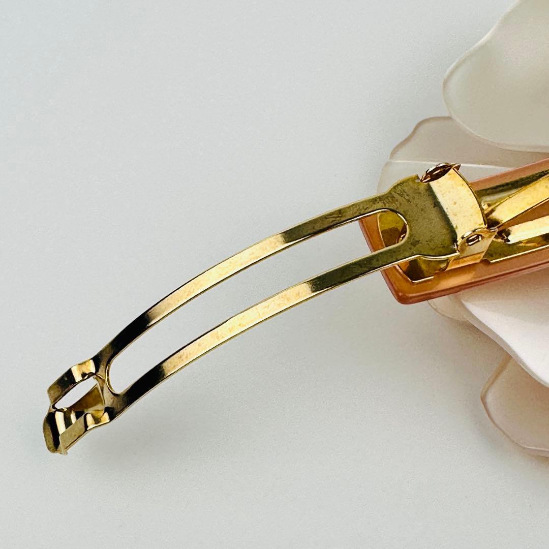 アレクサンドルドゥパリ　アイボリー 花型 ヘアピン　ヘアアクセサリー　ロゴ