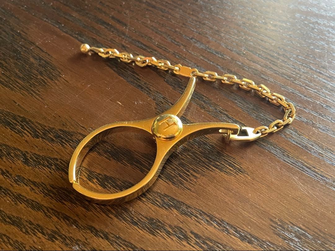 HERMES エルメス グローブホルダー ゴールドカラー 手袋