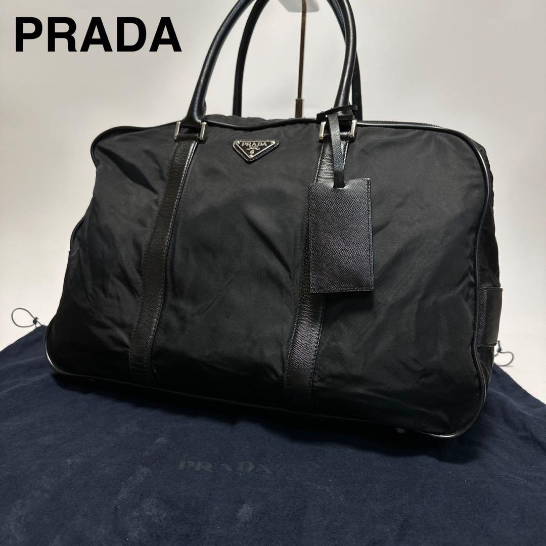 u35【近年モデル】保存袋付　プラダ　サフィアーノ　黒　南京錠　ハンドバッグ.