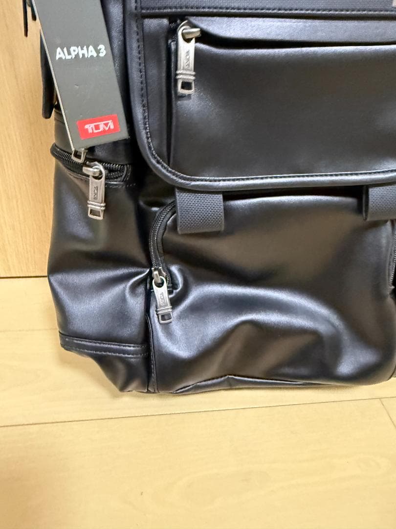 TUMIブラック牛革ALPHA 3ショルダーバッグビジネス通勤リュック