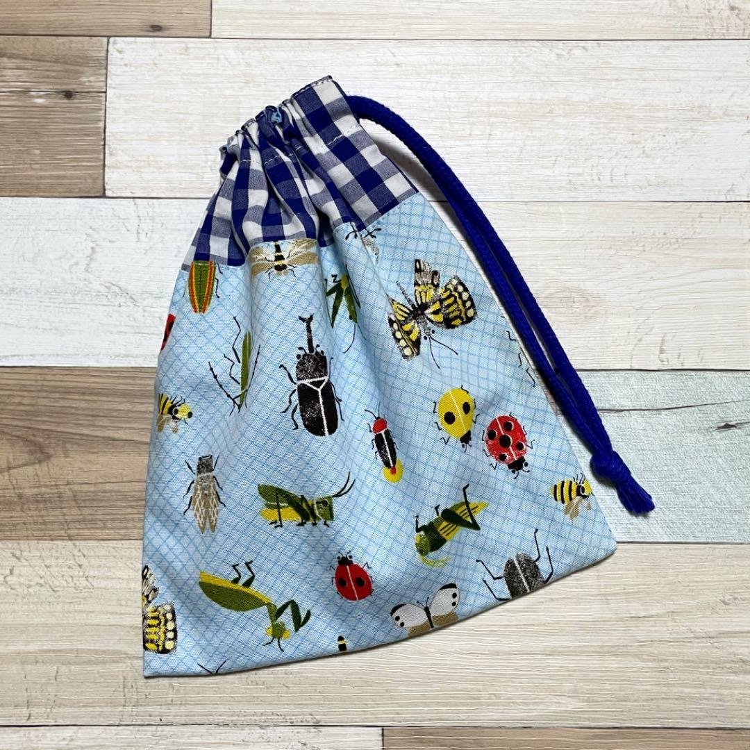 ハンドメイド★サックス。昆虫プリント×チェック切替片側紐出し巾着。入園グッズ