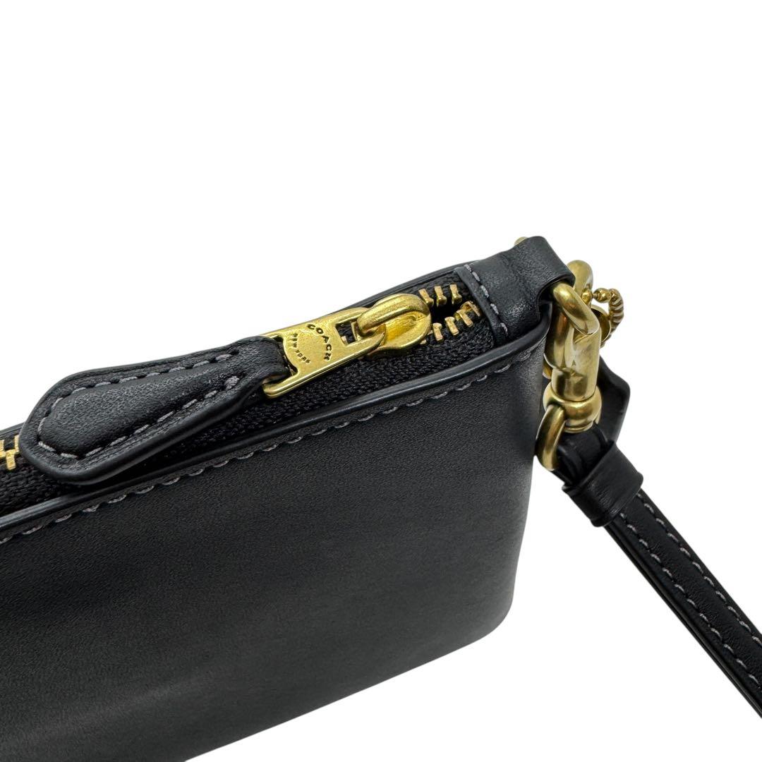 極美品 コーチ ポーチ ディズニーコラボ プルート ブラック 現行