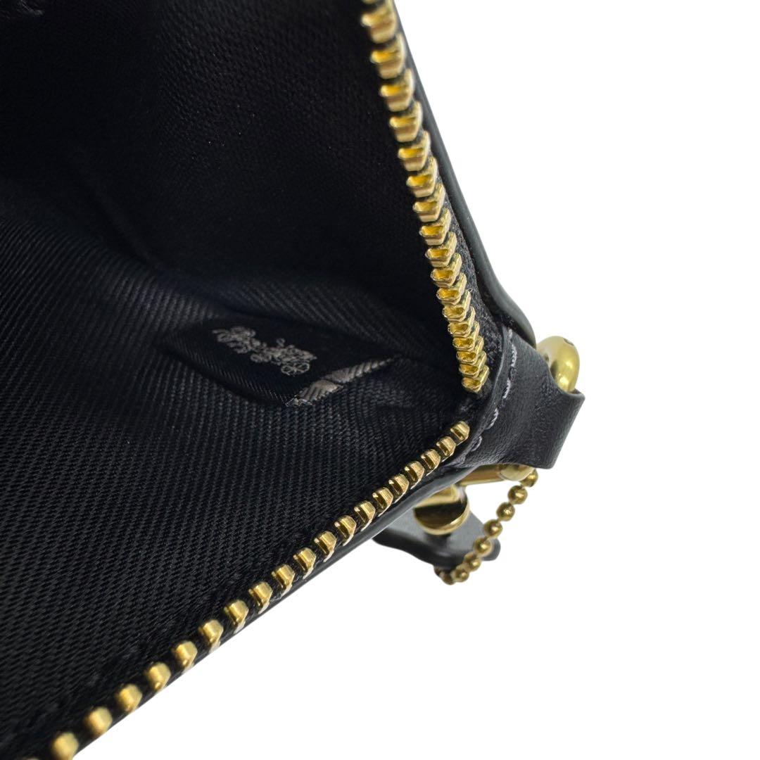 極美品 コーチ ポーチ ディズニーコラボ プルート ブラック 現行