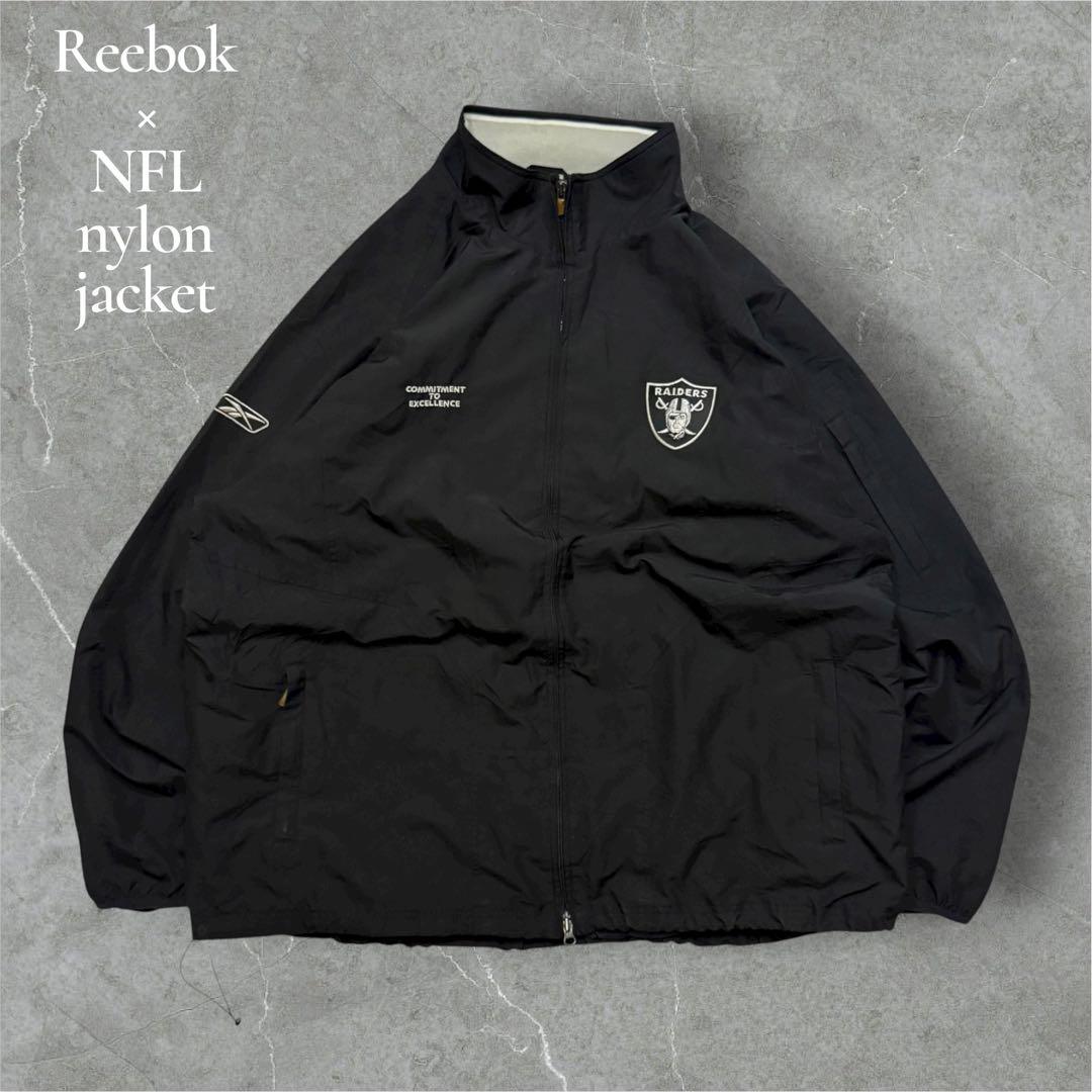 Reebokリーボック × RAIDERSレイダースNFLナイロンジャケット
