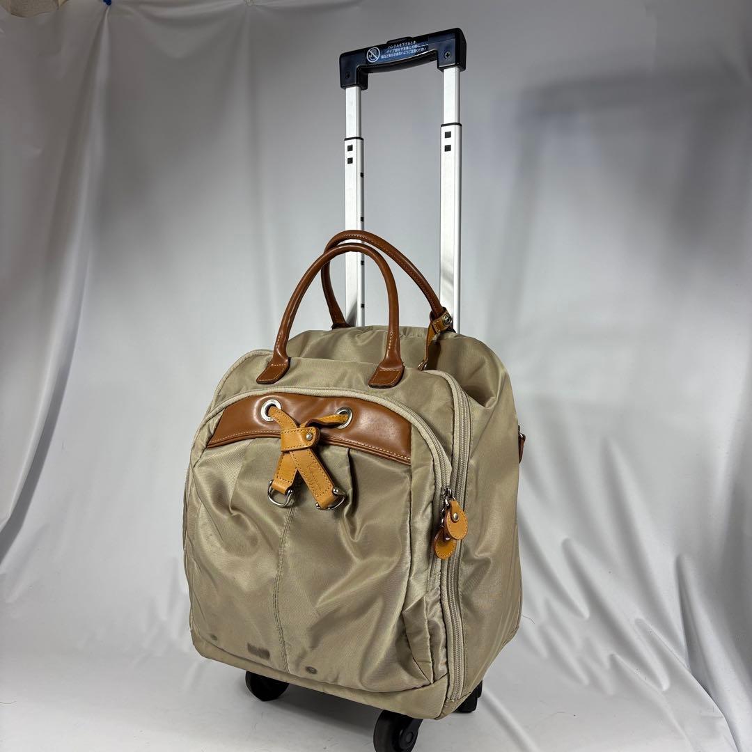 カナナプロジェクト トローリーバッグ キャリー ベージュ　ポンポンチャーム付き