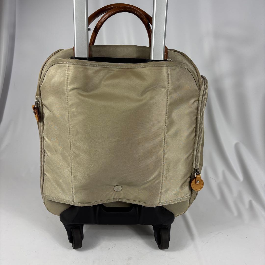 カナナプロジェクト トローリーバッグ キャリー ベージュ　ポンポンチャーム付き