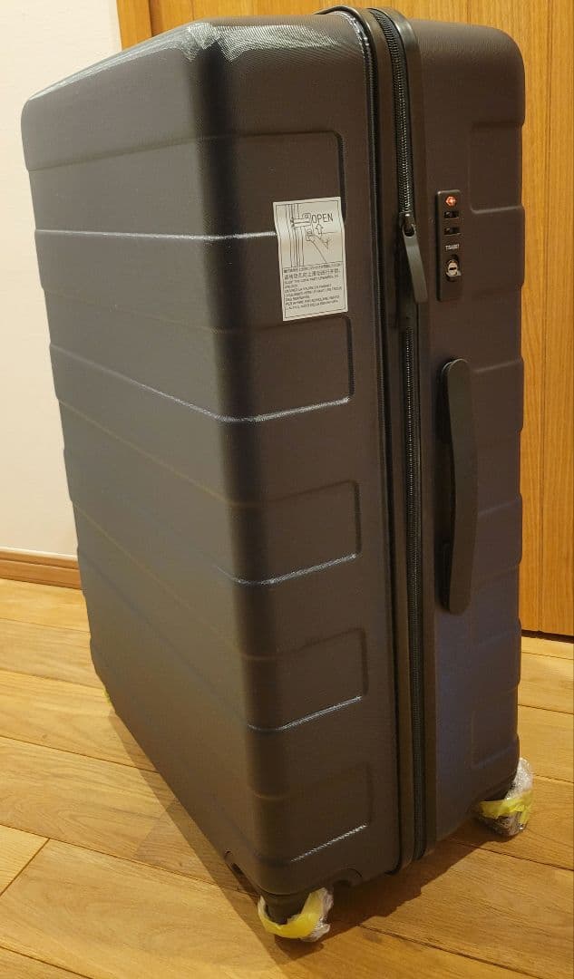 キャリーバーの高さを自由に調節できるストッパー付きハードキャリー 87Ｌネイビー