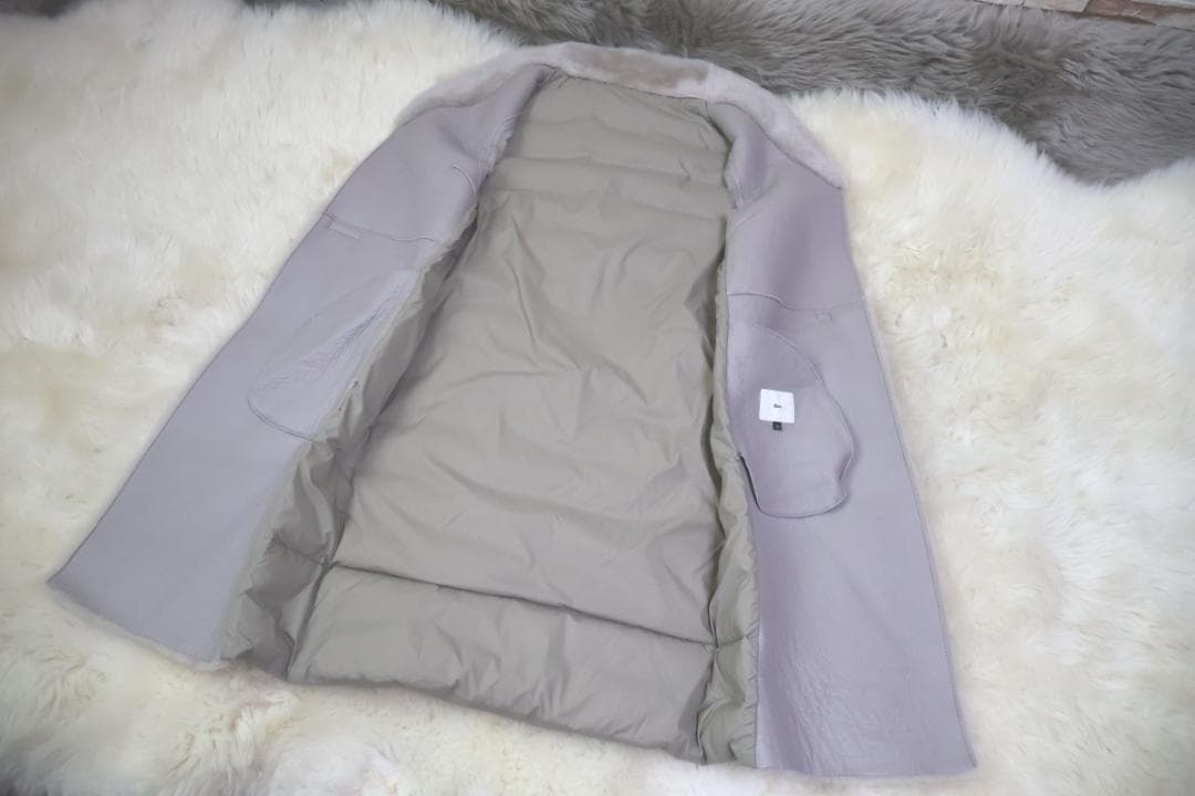 Sov ソブ の ムートン 毛皮ファーを使用した ダウン ジレ コート