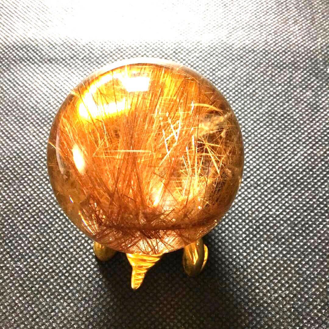 ゴールドルチルクォーツ置物　丸玉　ブラジル産　直経約4.83cm 重さ約160g