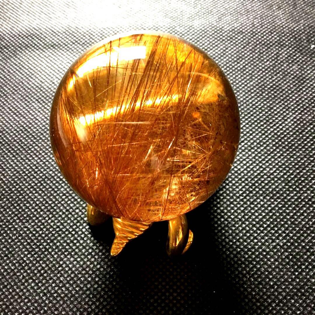 ゴールドルチルクォーツ置物　丸玉　ブラジル産　直経約4.83cm 重さ約160g