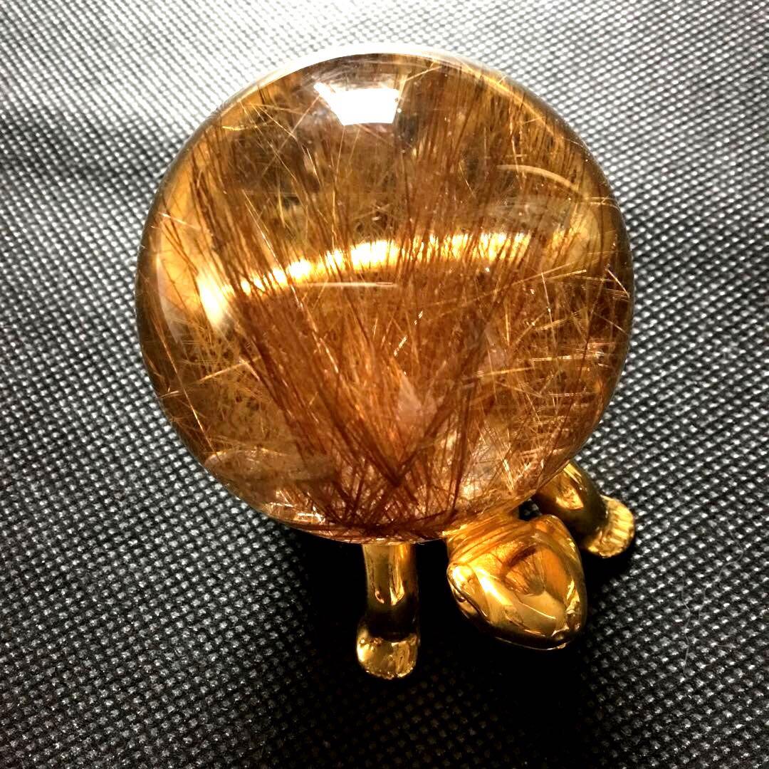 ゴールドルチルクォーツ置物　丸玉　ブラジル産　直経約4.83cm 重さ約160g