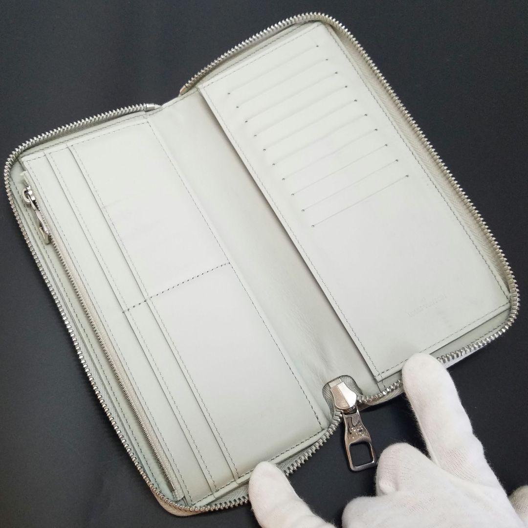 ルイヴィトン トリヨンレザー ヴェルティカル ジッピーウォレット ミネラルグレー