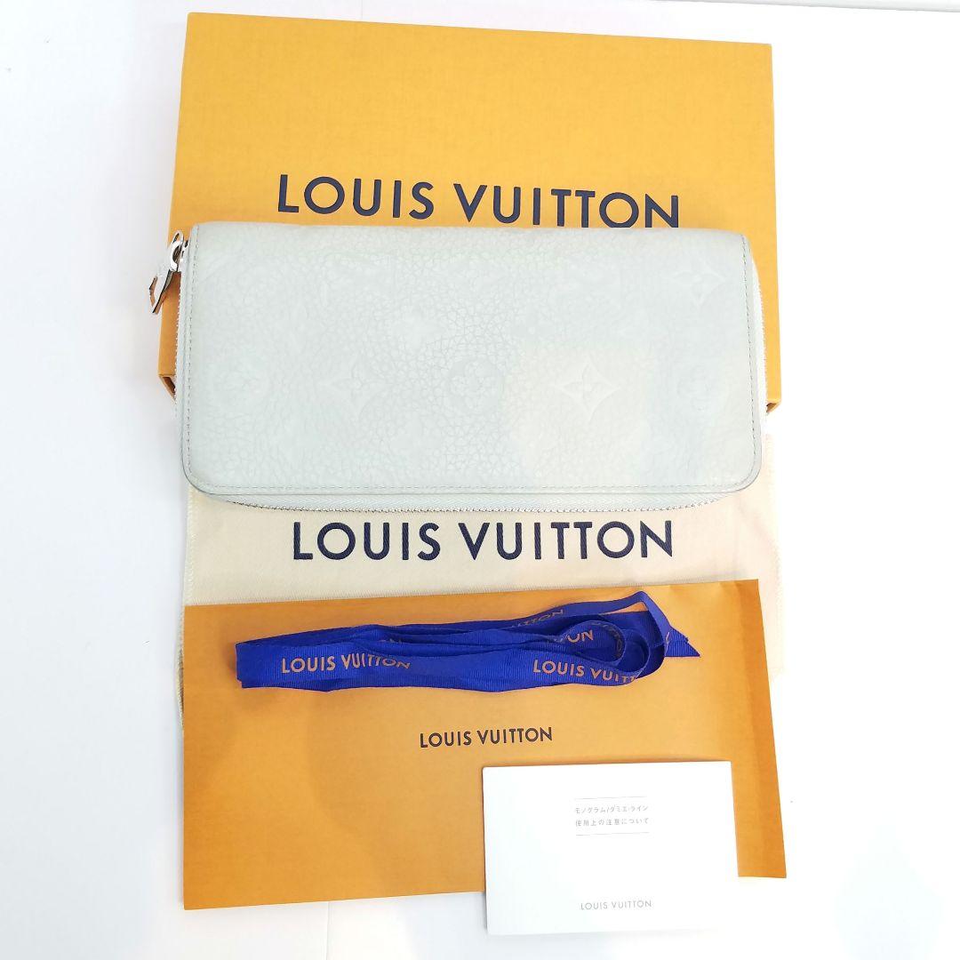 ルイヴィトン トリヨンレザー ヴェルティカル ジッピーウォレット ミネラルグレー