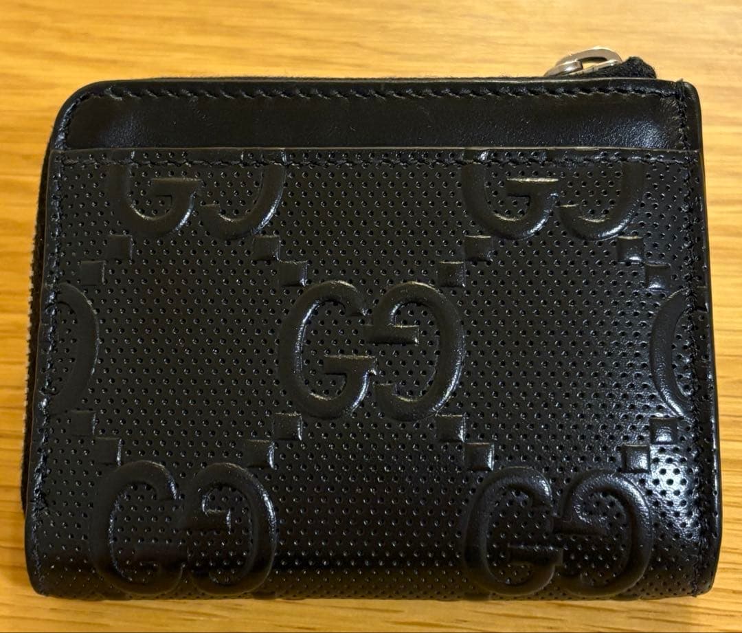 グッチ GUCCI ラウンドファスナー 財布 GG Emboss ブラック