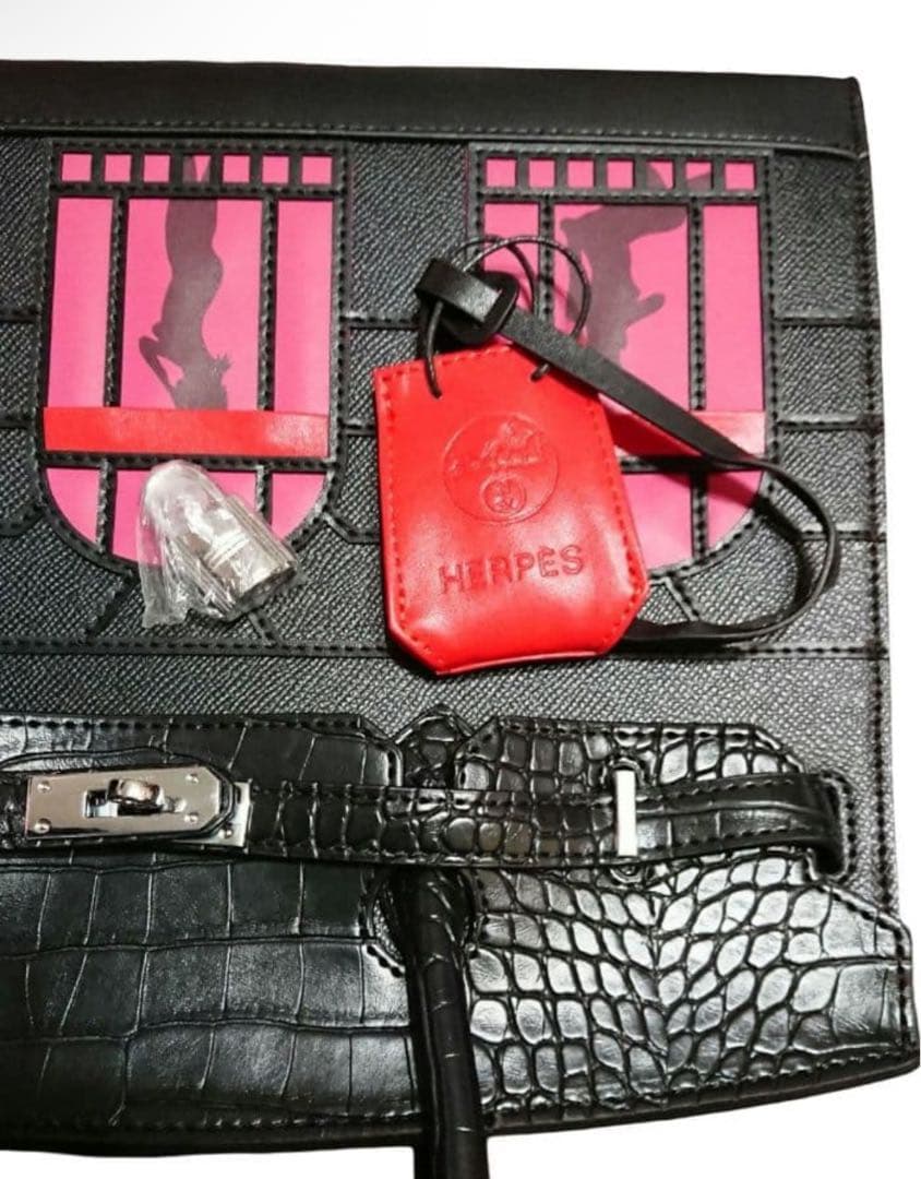 ヘルペスバッキン レザーハンドバッグ