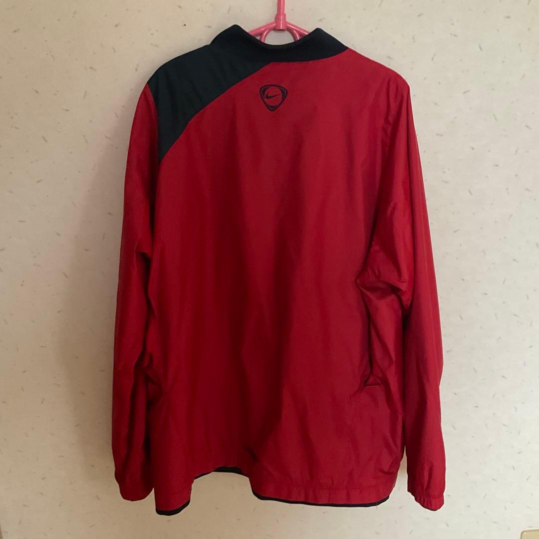 鹿島アントラーズNike ピステ・ウィンドブレーカー レッド/ネイビー