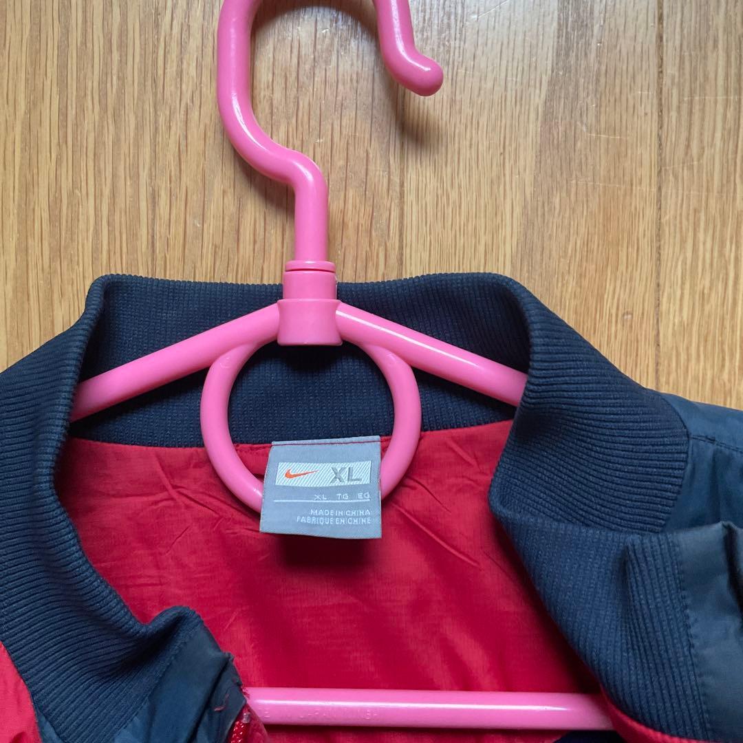 鹿島アントラーズNike ピステ・ウィンドブレーカー レッド/ネイビー