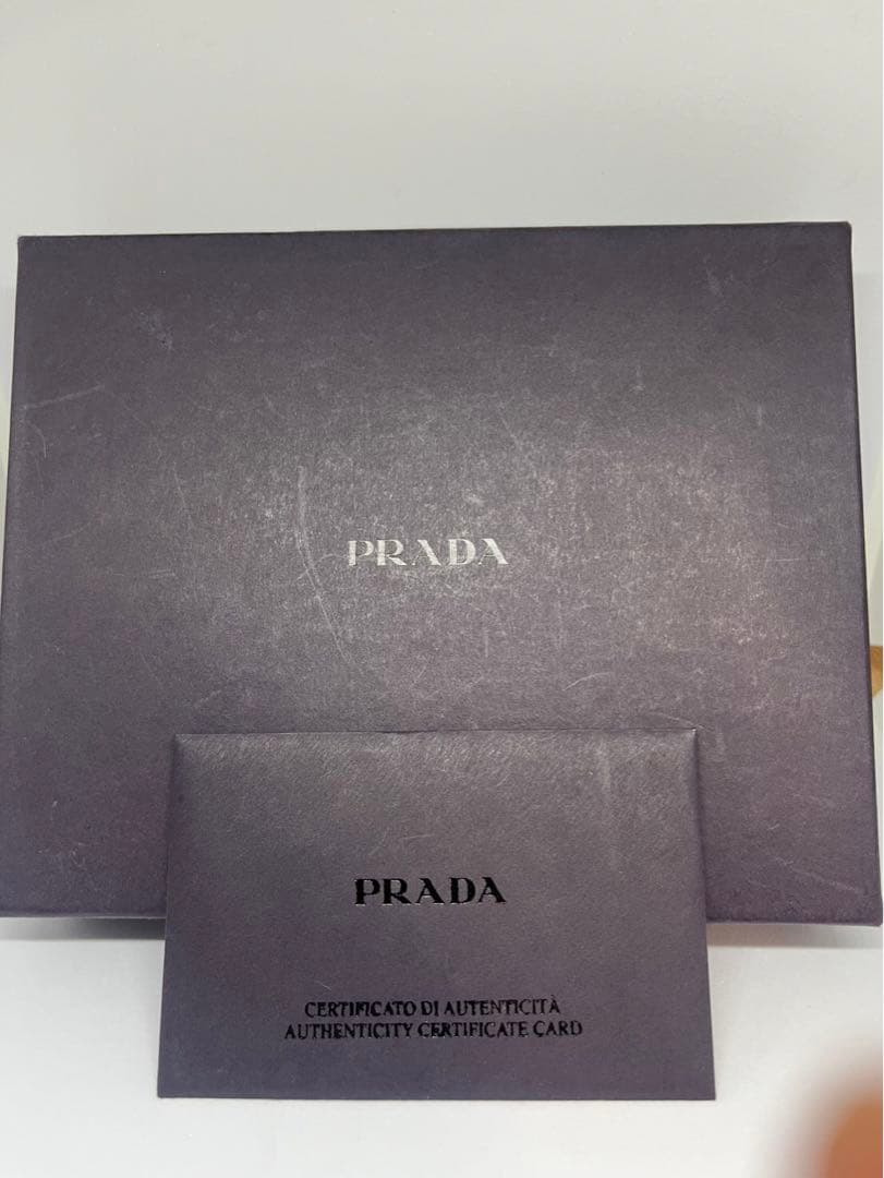 PRADA プラダ　サフィアーノ　二つ折り財布　ピンク 付属品あり