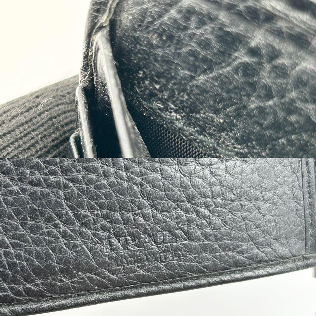 PRADA マネークリップ 折り財布 二つ折り ロゴ シルバー金具 シボ革 黒