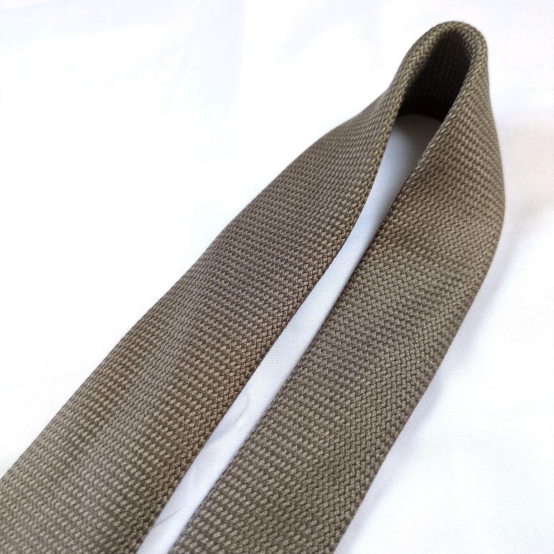 【美品】エルメス ネクタイ グレージュ 無地 ソリッド 織り込み【フランス製】