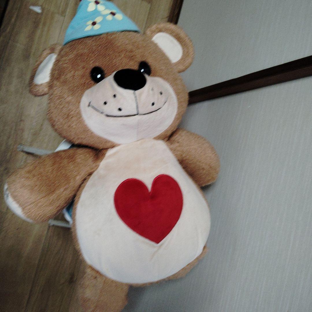 茶色いクマのぬいぐるみ 青い帽子付き