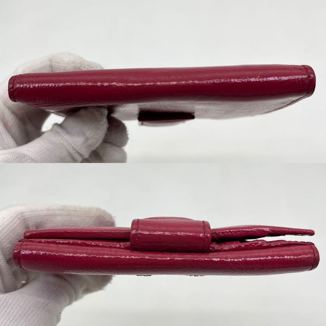 イヴサンローラン 二つ折り財布 カサンドラ YSLロゴ パテントレザー ピンク