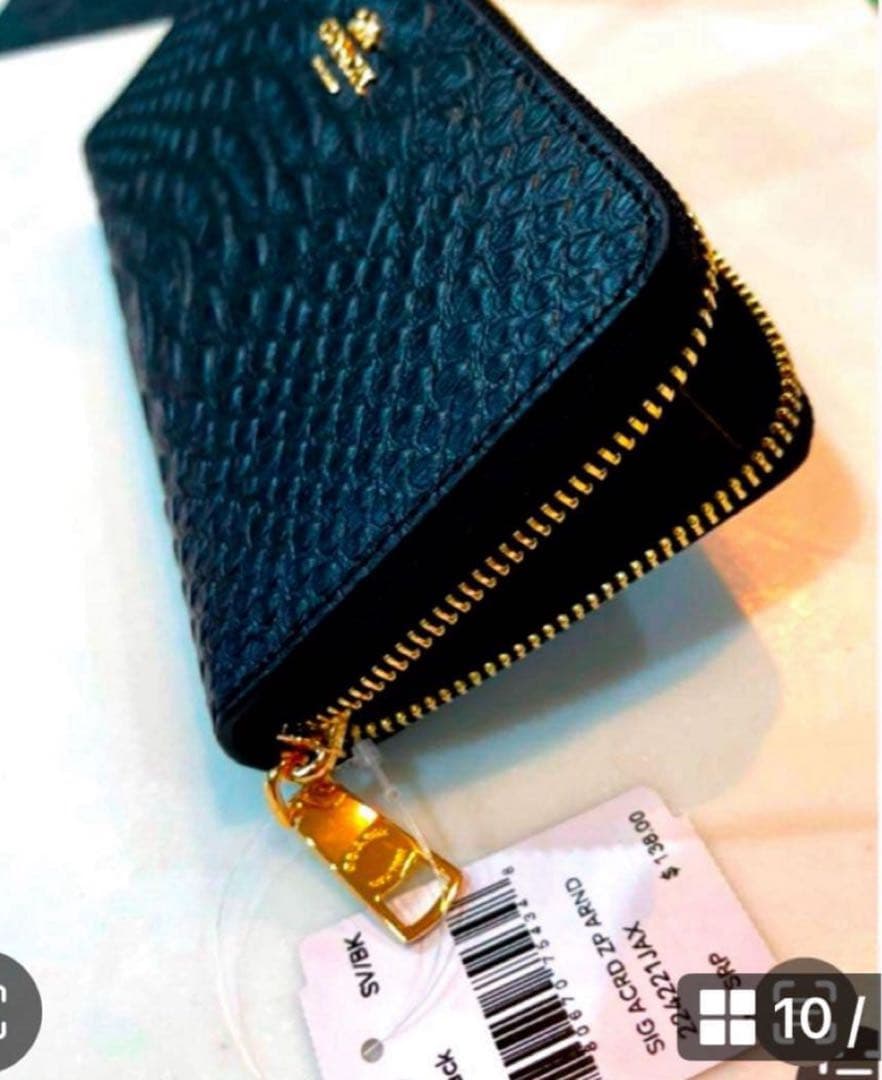 新品未使用品コーチエンボスドスネークレザー長財布【ブラック黒】メンズ　レディース