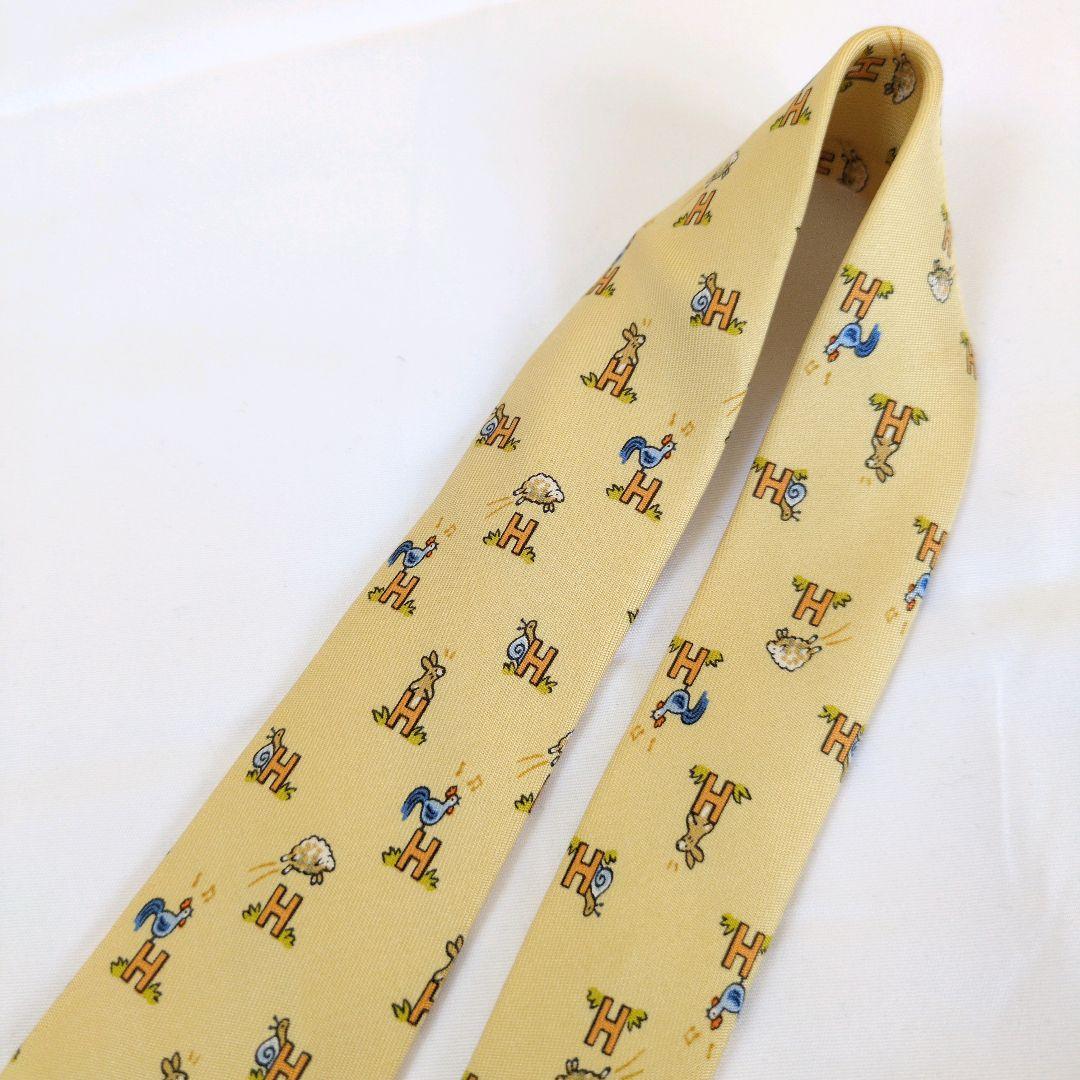 【美品】エルメス ネクタイ イエロー・オレンジ H柄 動物柄【フランス製】