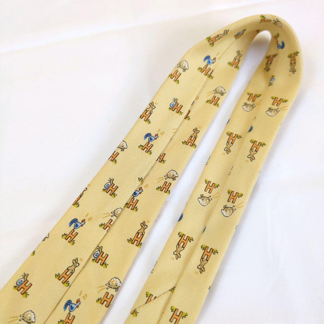 【美品】エルメス ネクタイ イエロー・オレンジ H柄 動物柄【フランス製】