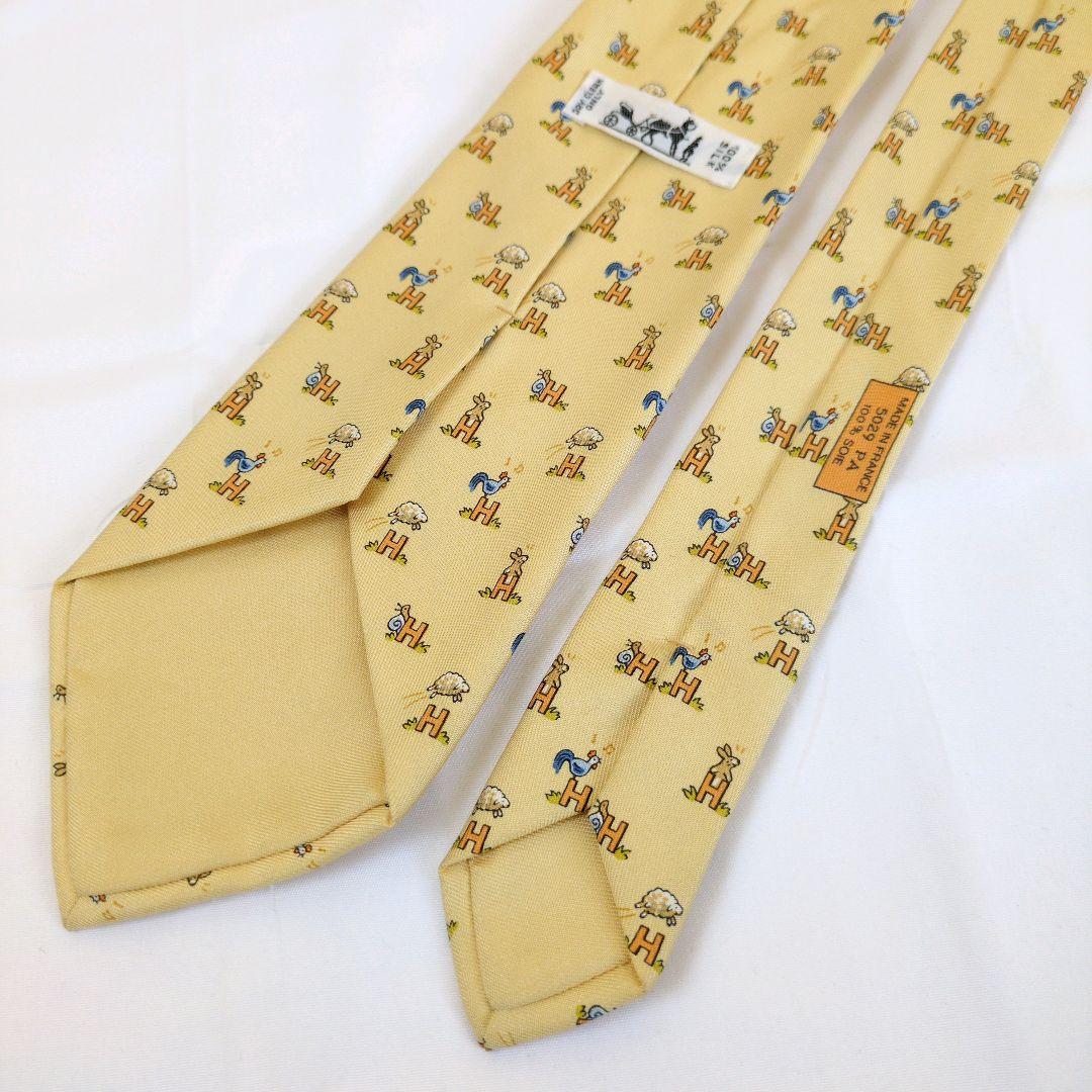 【美品】エルメス ネクタイ イエロー・オレンジ H柄 動物柄【フランス製】