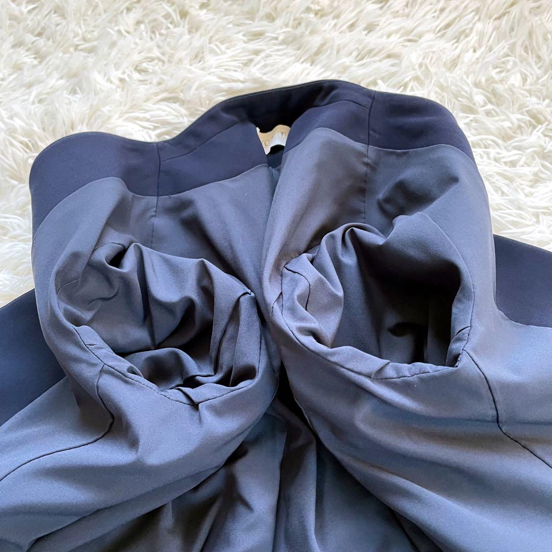 PLSTプラステ ネイビーノーカラージャケットパンツスーツセットアップ洗える