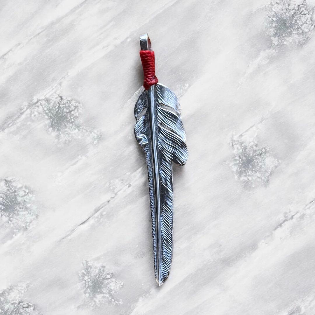 Larry smith 紐巻き風切りフェザーLサイズ　ペンダント