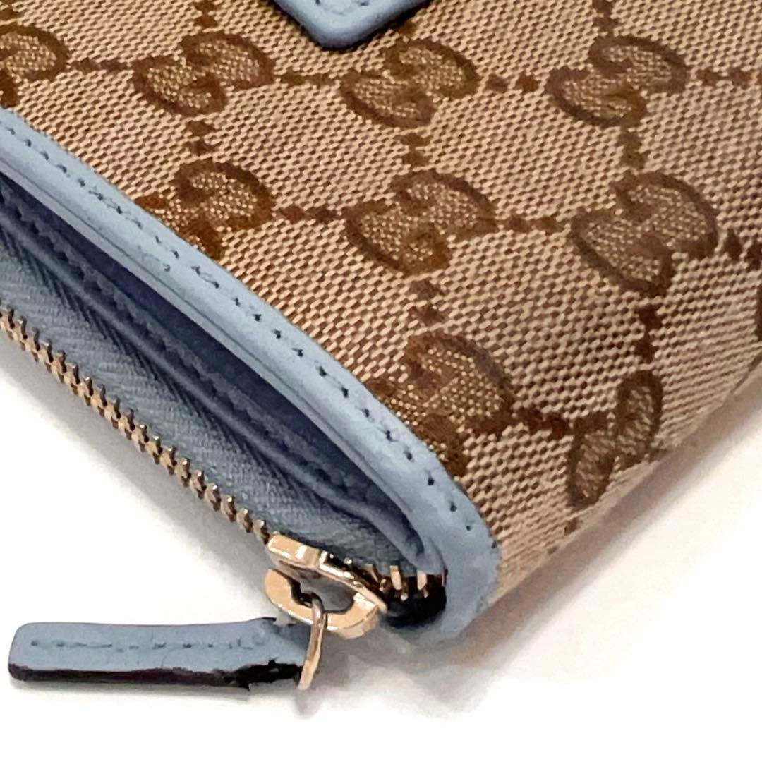 グッチ 折り財布 GGキャンバス GG ラウンドファスナー コンパクト 水色