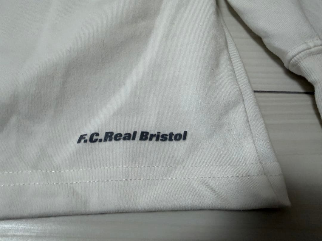 FCRB BLURRED LOGO L/S TEAM POCKET TEE 白M