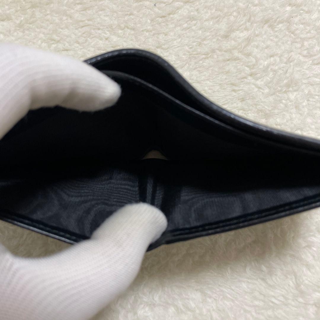 GUCCI　グッチ　折り財布　エンボス　ブラック　美品‼️