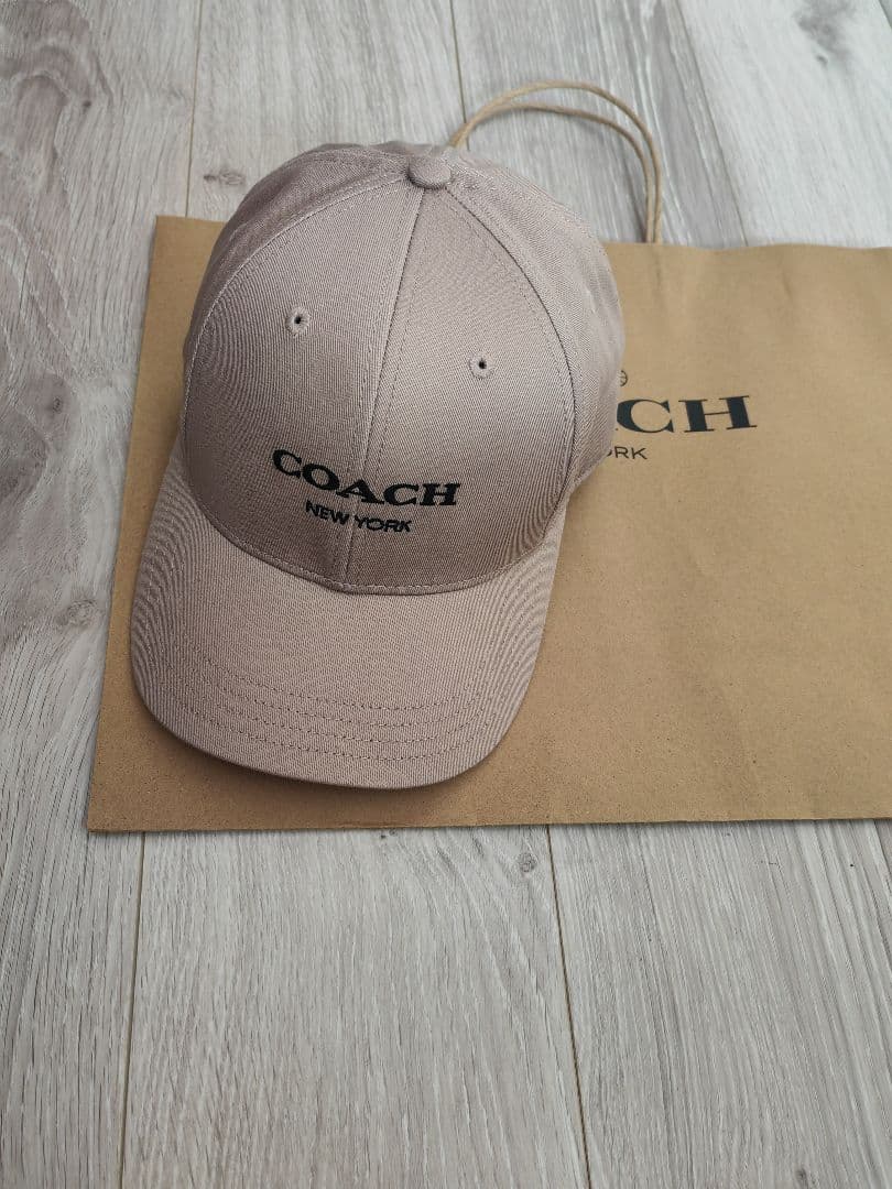 COACH ベージュ キャップ ロゴ入り