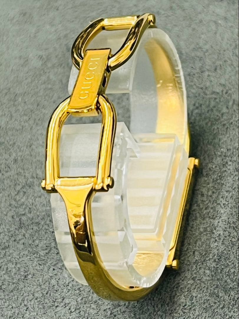 【電池交換済】グッチ レディース 腕時計 1500 白文字盤 シェル ゴールド