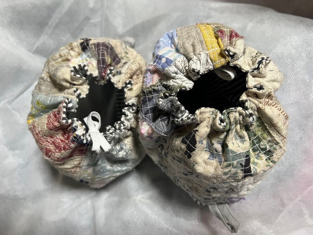 毛塚千代さんの糸食い袖カバー