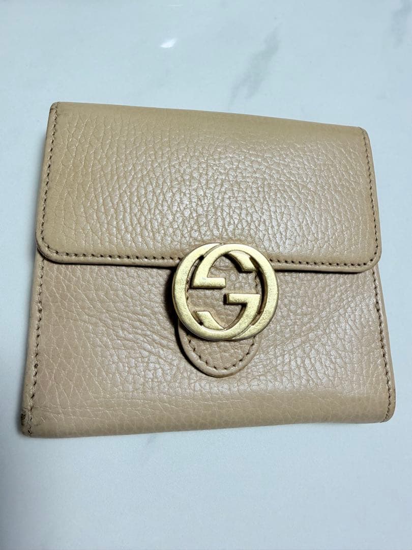 Gucci レザー二つ折り財布 ベージュ